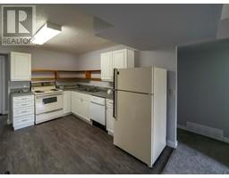 Laundry room - 1 4 415 Royal Avenue Nw, Diamond Valley, AB T0L2A0 Photo 6