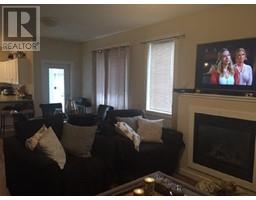 Living room - 8712 17 St Ne Street, Dawson Creek, BC V1G0H1 Photo 4