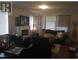 Living room - 8712 17 St Ne Street, Dawson Creek, BC V1G0H1 Photo 3
