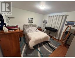 Bedroom 2 - 5347 Elm St, Niagara Falls, ON L2E2V5 Photo 5