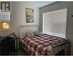 Primary Bedroom - 695 Academy Way Unit 207, Kelowna, BC V1V0C7 Photo 7