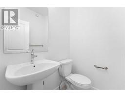 2pc Bathroom - 59 Belgian Crescent, Cochrane, AB T4C3C3 Photo 4