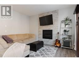 Living room - 113 Garson Place, Fort Mcmurray, AB T9H1L1 Photo 5
