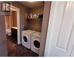 Laundry room - 4 10220 97 Avenue, Fort St John, BC V1J0C9 Photo 6