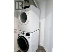 Laundry room - 306 5 Rowntree Rd S, Toronto, ON M9V5G9 Photo 7
