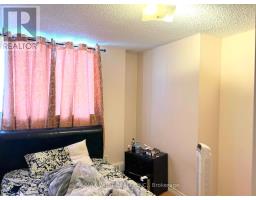 Bedroom 2 - 306 330 Dixon Rd, Toronto, ON M9R1S9 Photo 5