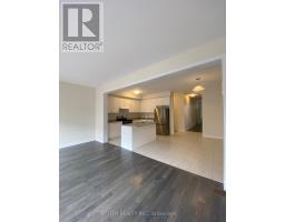 Great room - 135 Keelson St, Welland, ON L3B0M6 Photo 3