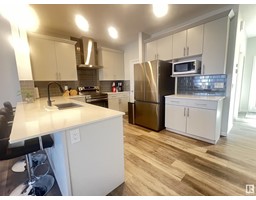 Great room - 9830 225 A St Nw, Edmonton, AB T5T7R7 Photo 7