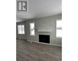 Living room - 6301 58 A Street, Rocky Mountain House, AB T4T0C2 Photo 6