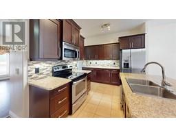 Kitchen - 11 300 Sparrow Hawk Drive, Fort Mcmurray, AB T9K0Y6 Photo 6