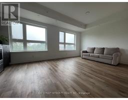 Living room - 301 2100 Bridletowne Circ, Toronto, ON M1W2L1 Photo 2