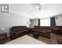 Family room - 104 Arabian Drive, Fort Mcmurray, AB T9H5K4 Photo 6