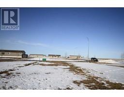166 Meadows Crescent, Taber, AB T1G0G7 Photo 2