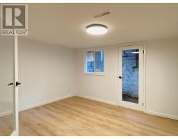 Living room - Lower 1077 Queen St W, Toronto, ON M6J1H3 Photo 2