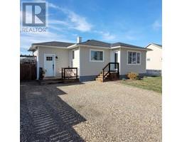 Family room - 5031 41 Avenue, Taber, AB T1G1A7 Photo 7