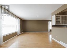 Family room - 138 Maclaren Crescent, Fort Mcmurray, AB T9K1N7 Photo 4