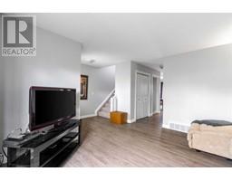 Living room - 169 Diefenbaker Drive, Fort Mcmurray, AB T9K2J8 Photo 4
