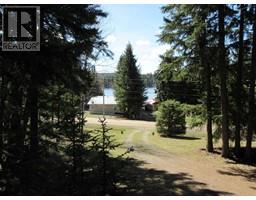 Primary Bedroom - 7637 Burgess Road, Deka Lake Sulphurous Hathaway Lakes, BC V0K1X3 Photo 7