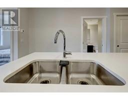 Laundry room - 114 238 Sage Valley Common Nw, Calgary, AB T3R1X8 Photo 5