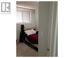 Bedroom - 7 5601 Dalton Drive Nw, Calgary, AB T3A2E2 Photo 5