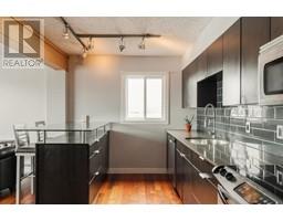 Eat in kitchen - 403 526 22 Avenue Sw, Calgary, AB T2S0H6 Photo 3