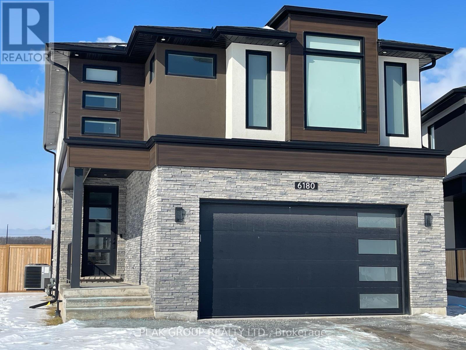 Lower 6180 Curlin Crescent