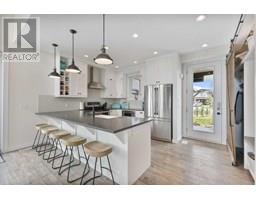 Living room - 332 Cottageclub Way, Rural Rocky View County, AB T4C1C3 Photo 4