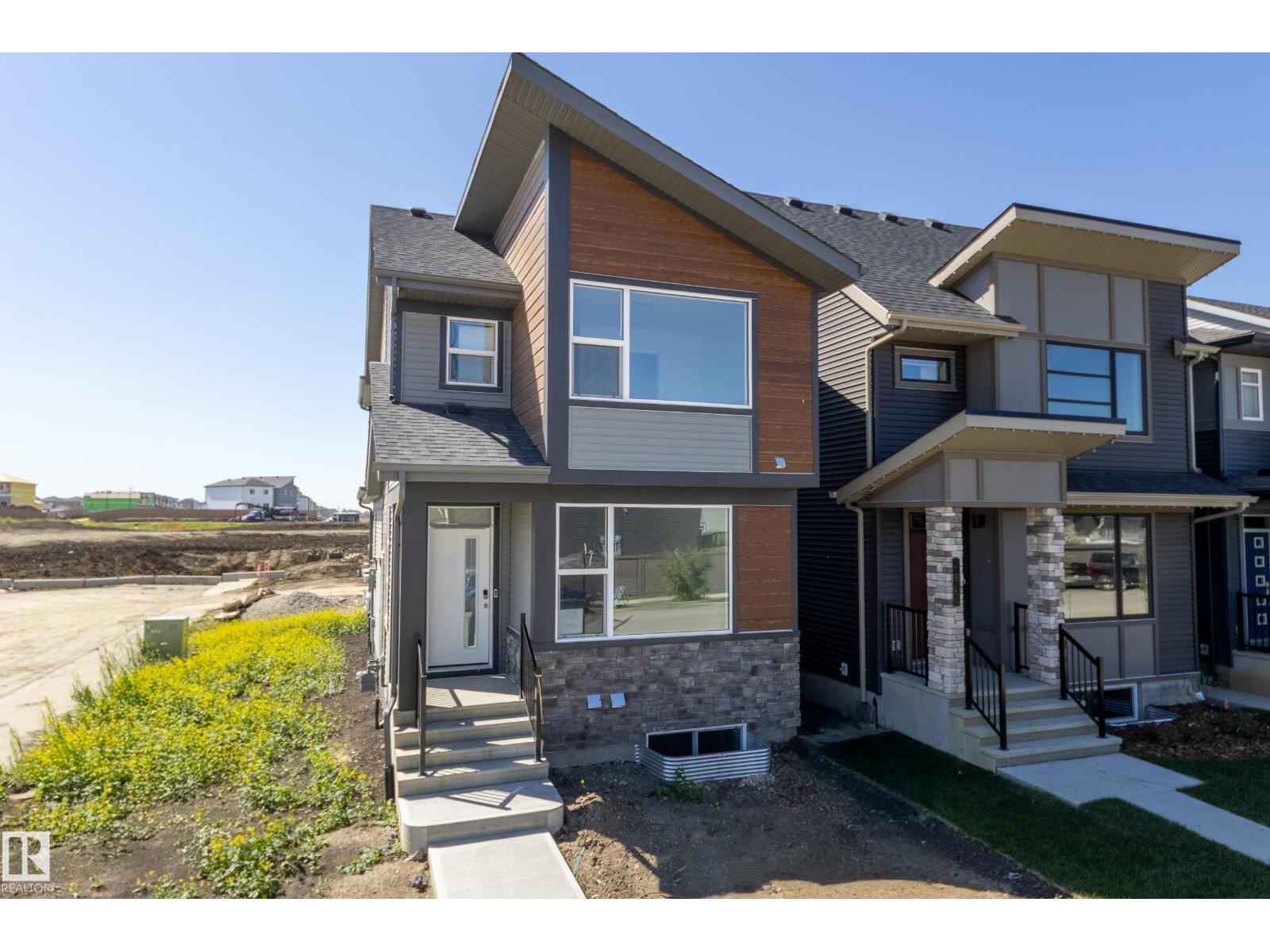20903 25 Av Nw