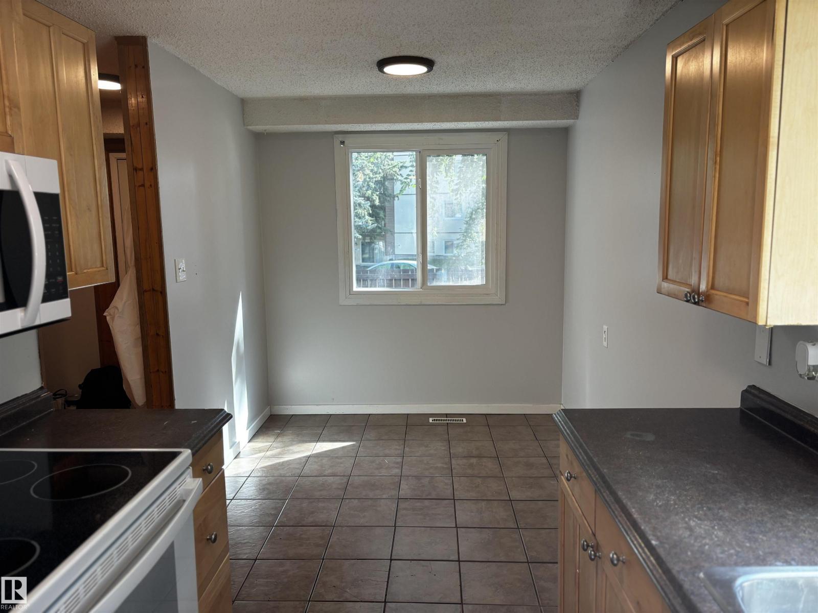 5446 144 B Av Nw