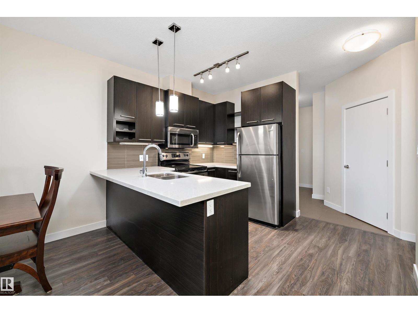 408 10418 81 Av Nw