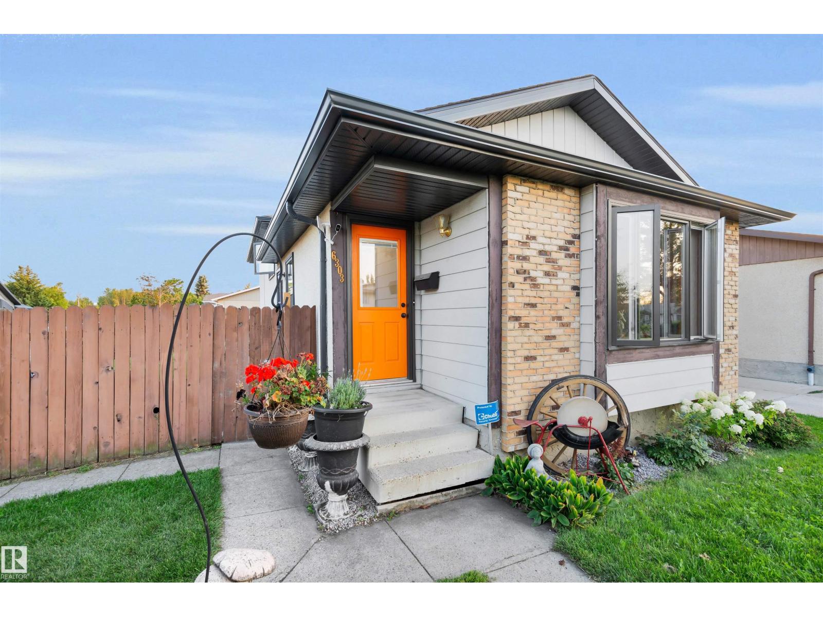 6303 11 Av Nw