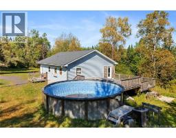 Family room - 29 Route 116, Upper Salmon Creek, NB E4A1J6 Photo 4