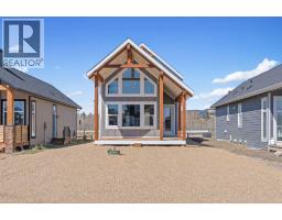 Kitchen - 48 Cottageclub Lane, Rural Rocky View County, AB T4C1B1 Photo 2