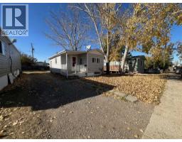 Living room - 19 400 1 Street Se, Linden, AB T0M1J0 Photo 2