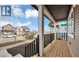 Living room - 5077 Harmony Circle, Rural Rocky View County, AB T3Z0K3 Photo 3