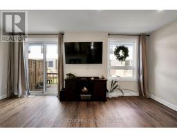Bedroom 2 - 108 175 Doan Drive, Middlesex Centre, ON N0L1R0 Photo 5
