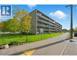 Living room - 510 Queenston Road Unit 103, Hamilton, ON L8K1J3 Photo 5