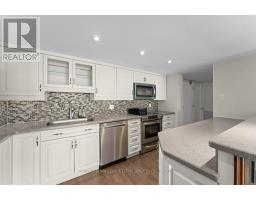 Living room - 105 50 Market St Street, Gananoque, ON K7G2M3 Photo 3