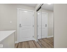 Living room - 316 1506 Tamarack Bv Nw, Edmonton, AB T6T2J5 Photo 3