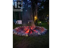 Bedroom - 146114 288 Street W, Priddis, AB T0L1W2 Photo 3