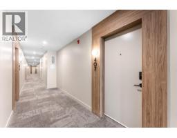 Living room - 9654 Benchland Road Unit 407, Lake Country, BC V4V0A5 Photo 2