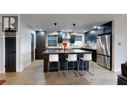 Family room - 6117 51 Avenue, Stettler, AB T0C2L2 Photo 4