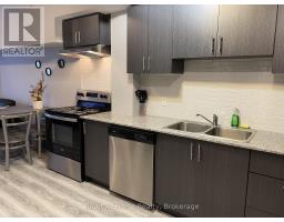 Living room - F 202 275 Larch Street, Waterloo, ON N2L0J3 Photo 4