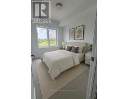 Bedroom 2 - 34 940 St David Street N, Centre Wellington, ON N1M2W3 Photo 5