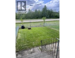 Living room - 84 5550 Simpson Trail, Fort Nelson, BC V0C1R0 Photo 2