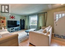 Living room - 3030 2nd Avenue, Regina, SK S4T0A8 Photo 2