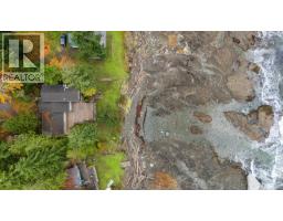 Primary Bedroom - 3495 Harwood Rd, Hornby Island, BC V0R1Z0 Photo 2