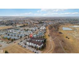 Bedroom 2 - 105 9930 100 Av, Fort Saskatchewan, AB T8L4P3 Photo 5