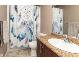 Family room - 38 Rue Bouchard, Beaumont, AB T4X0E6 Photo 4