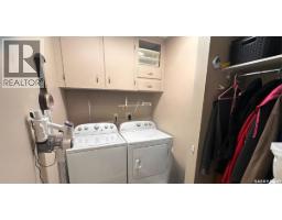 Living room - 240 8th Avenue Nw, Swift Current, SK S9H0Z8 Photo 2